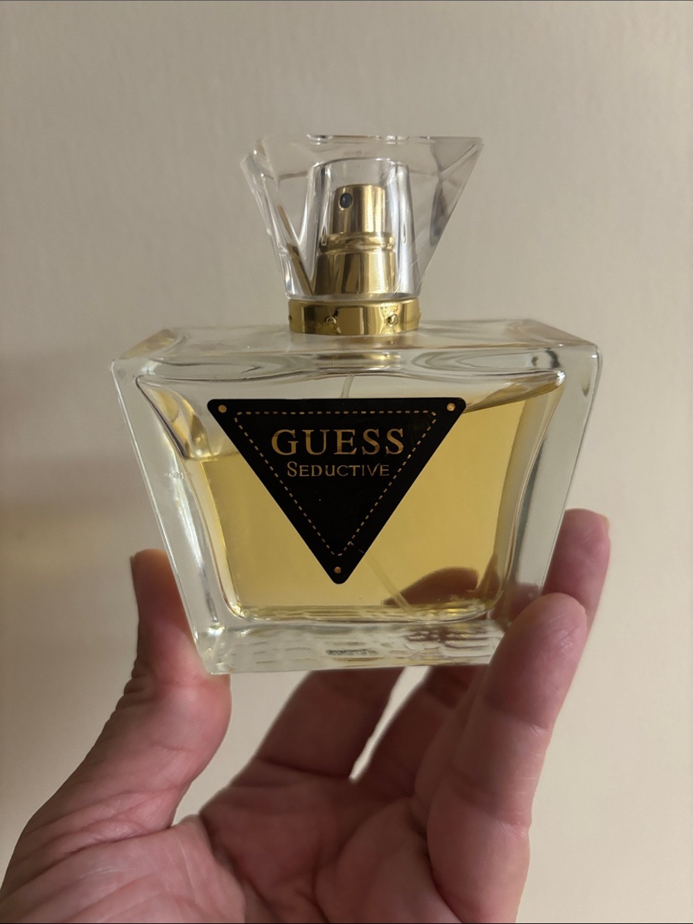 GUESS Seductive Clear Glass Bottle with Gold Accents